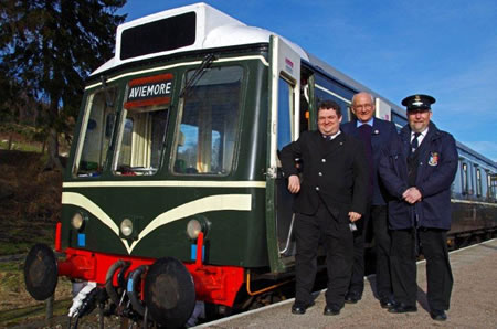 Panoramic Rail Car train crew at Boat of Garten Station on the Strathspey Railway